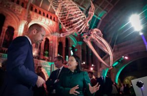 Maria talks to the Prince of Wales inside the Natural History Museum.